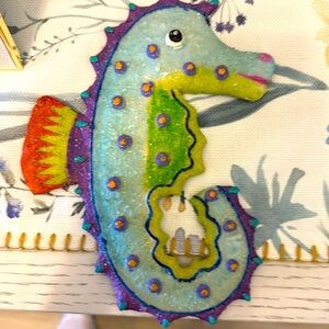 Approx. 8 3/4 “ long. Ready to hang on a wall